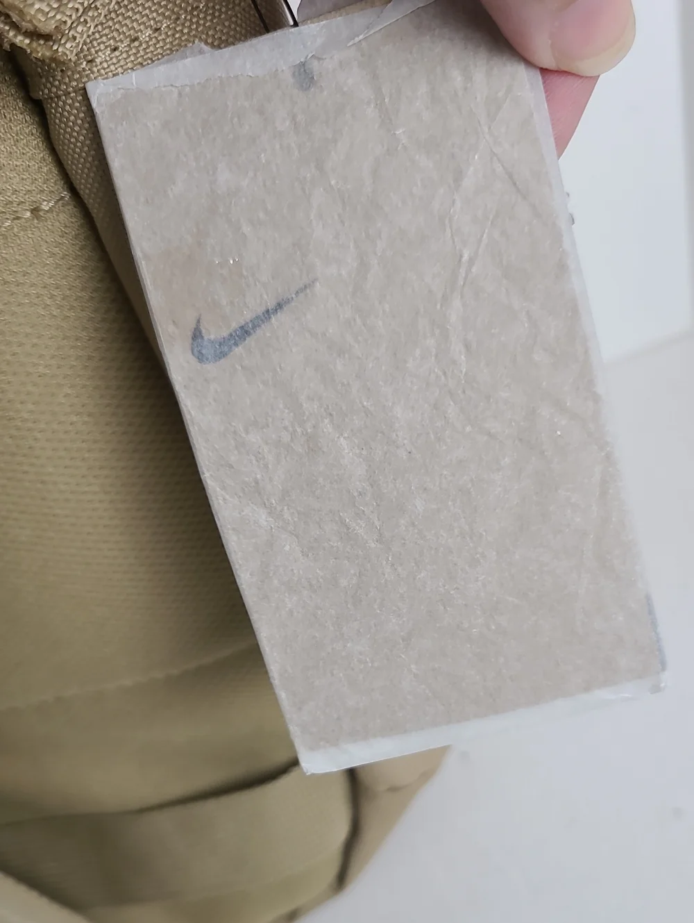 NWT NIKE Mulriple Zip Compartment Pockets Backpack Tan Beige with White Logo
